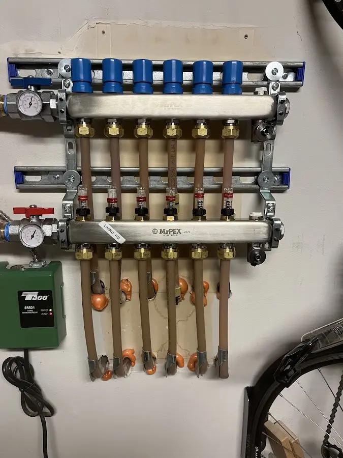 Plumber performing Leak Detection at a residential property in Emmaus